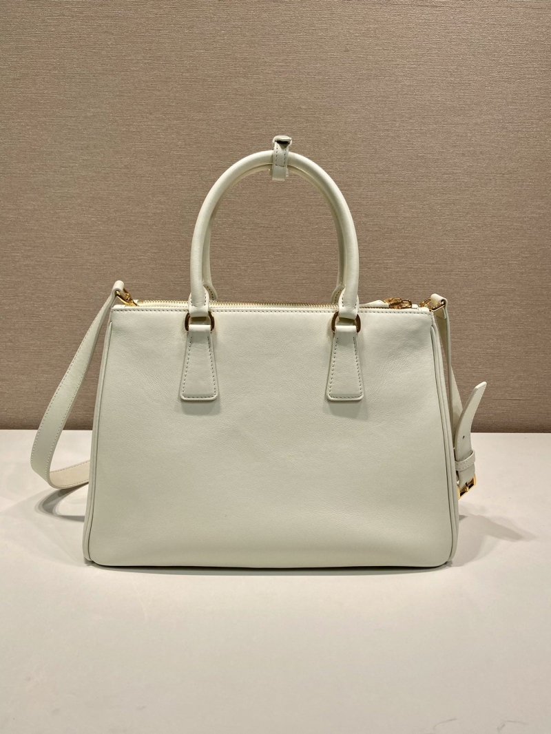 Pra*a top handle bags